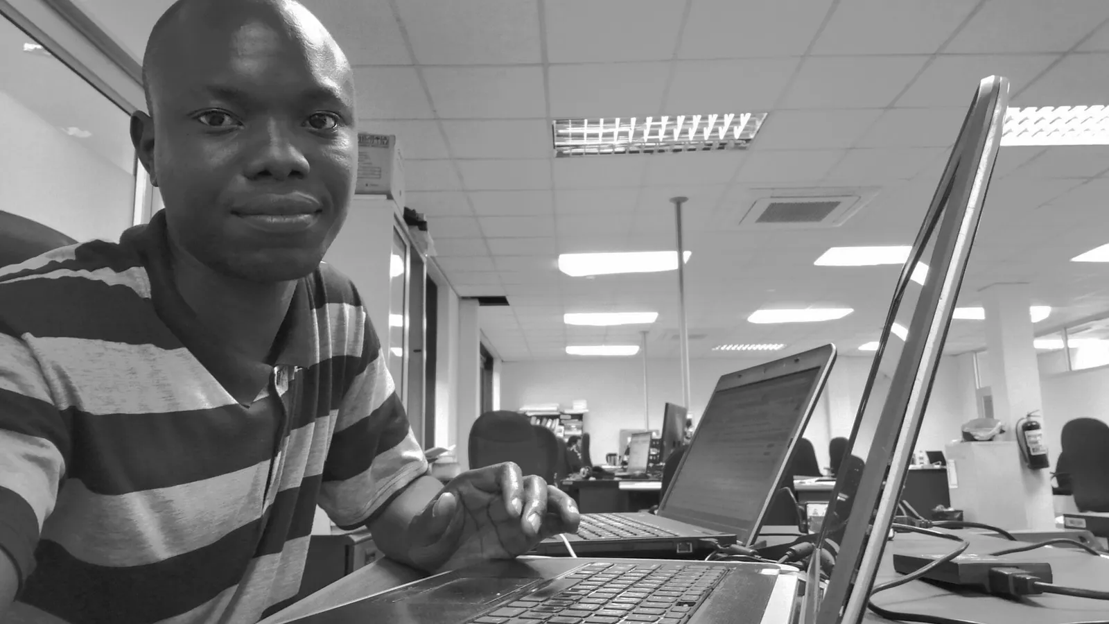 Software developer working at a desktop computer