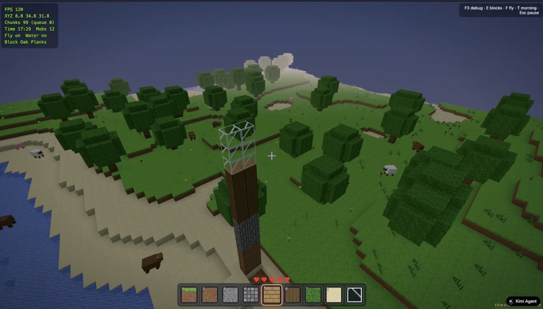 Aerial view of a tall player-built tower above the generated Kimi K3 voxel world